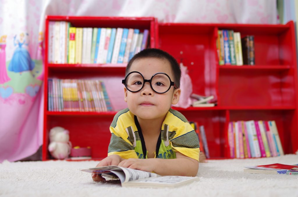 National Child Contact Centre Week - photo of a boy reading in a library setting